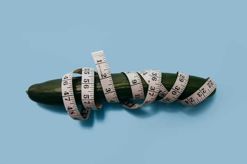 cucumber wrapped in a measuring tape
