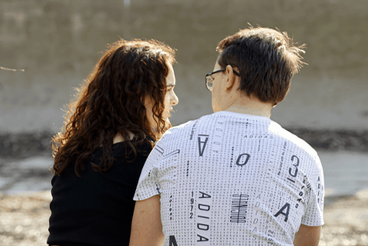 man and women discussing How To get hard fast without pills